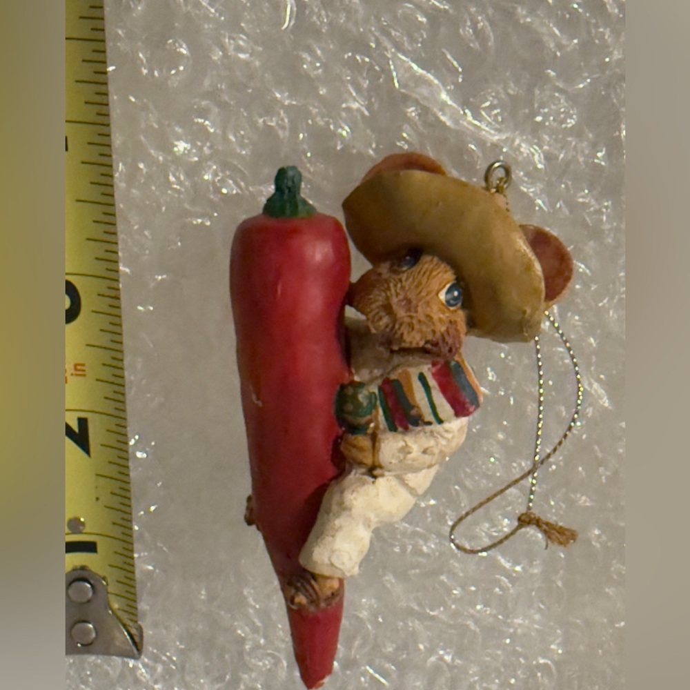 Mexican Mouse riding on a 🌶️ Red Pepper. Serape and a sombreros.